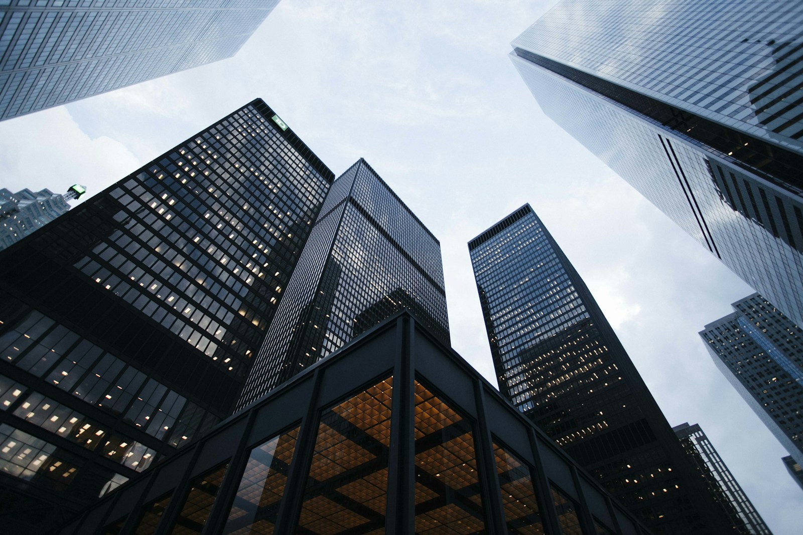 Corporate glass office towers representing major brand rebrands of 2025