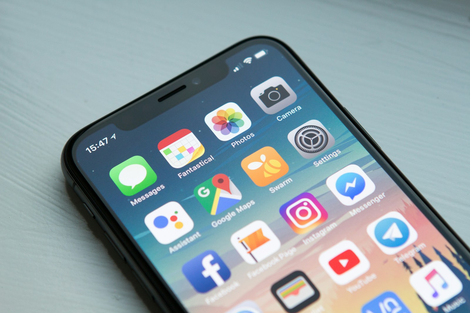 Person browsing website on smartphone for mobile-first design