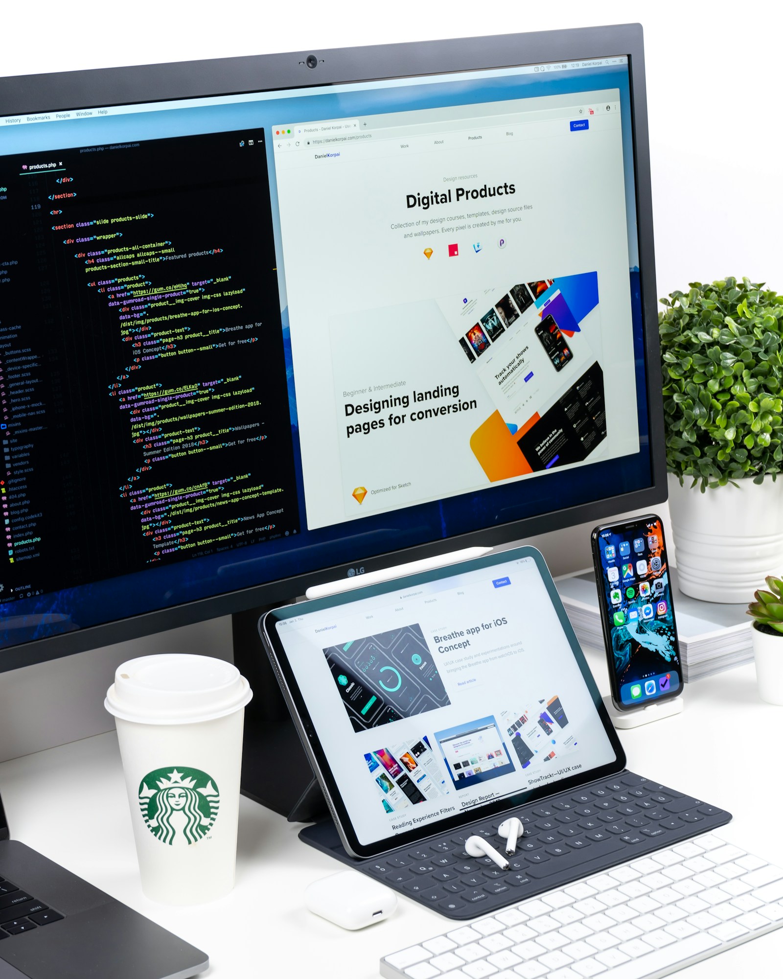 Modern web design workspace with code on monitor